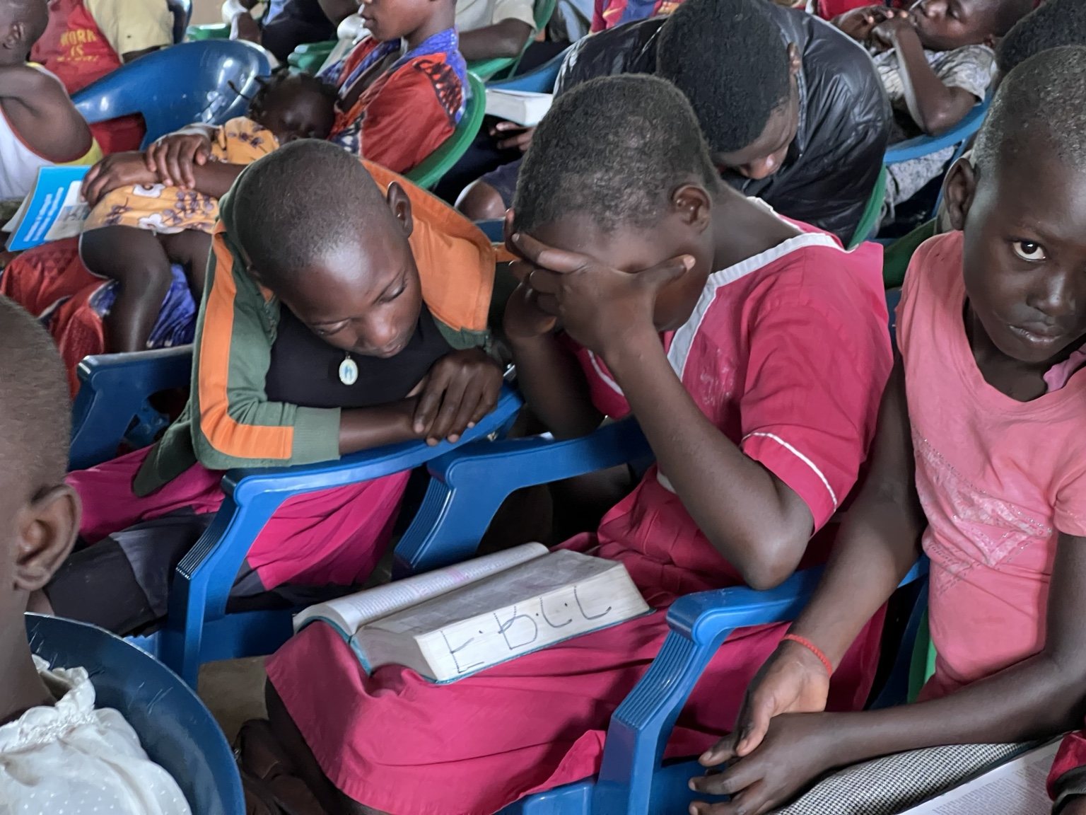 Children praying or reflecting