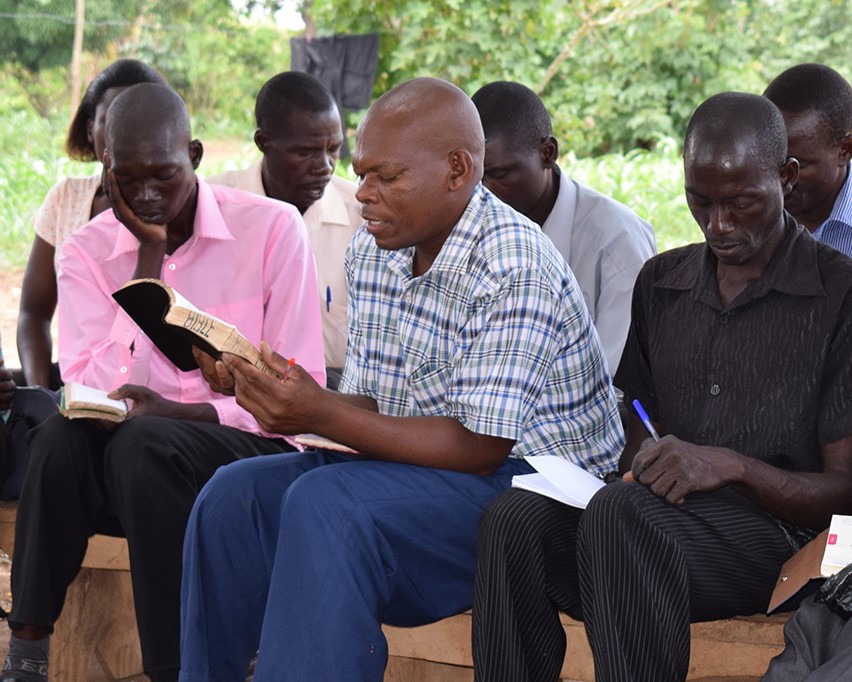 Rural church leaders and pastors studying the Bible together